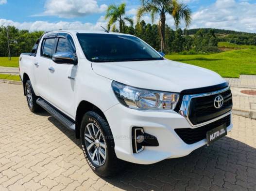 TOYOTA - HILUX - 2019/2020 - Branca - R$ 216.888,00